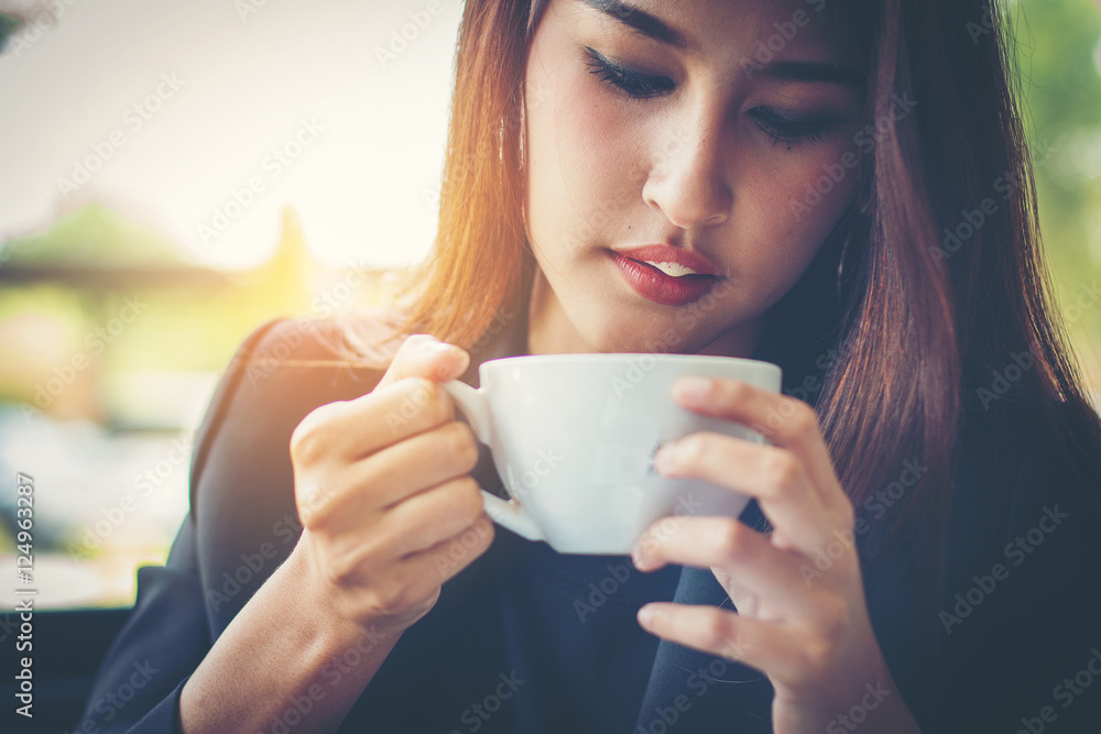 custom made wallpaper toronto digitalBusiness Woman thinking plan all about money return on investment on chair in office whith notebook and drink coffee