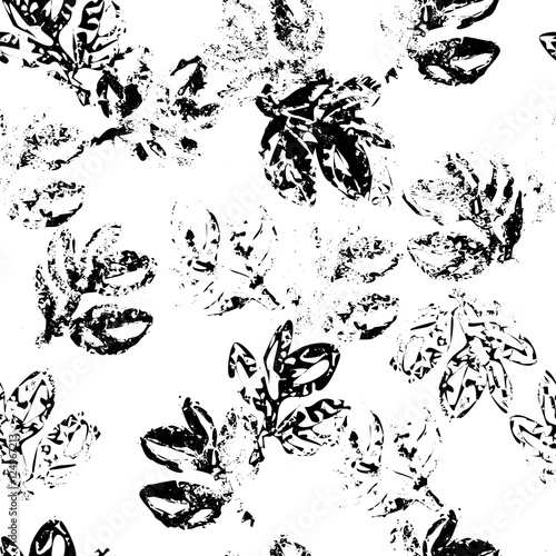 Leaves seamless pattern in grunge style. Brush strokes and ink. Monochrome vector pattern.Vector template for printing on fabric,seamless surfaces and wrapping paper.