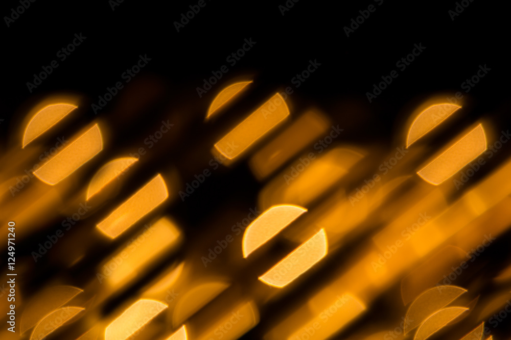 Bokeh dark orange circles and stripes on black background. Abstract ...