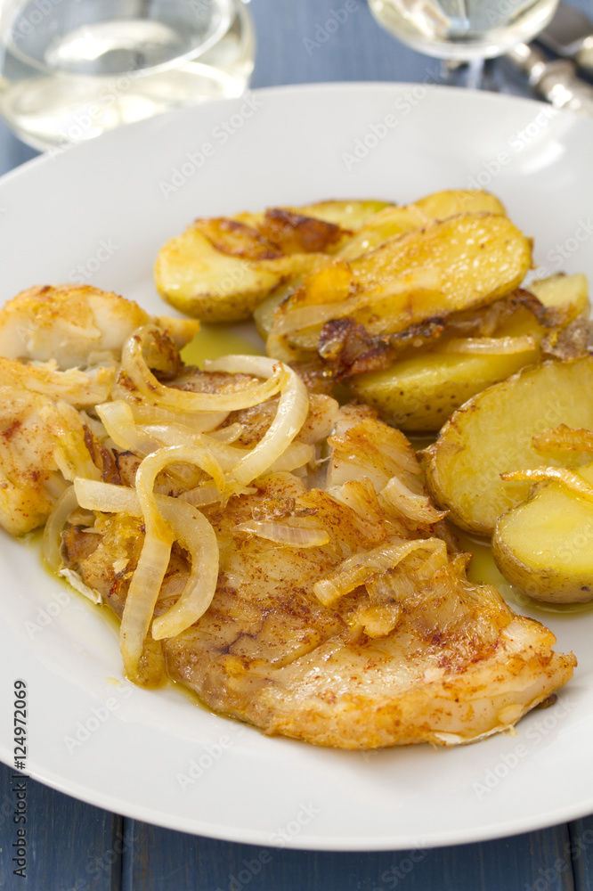 cod fish with potato on white plate cod fish with potato on white plate