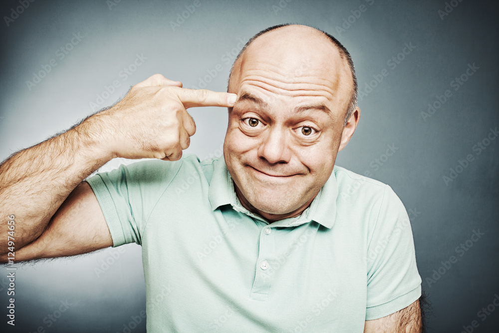 Close Up A Man Pointing His Finger To His Head In A Shoot Hims Photos Adobe Stock