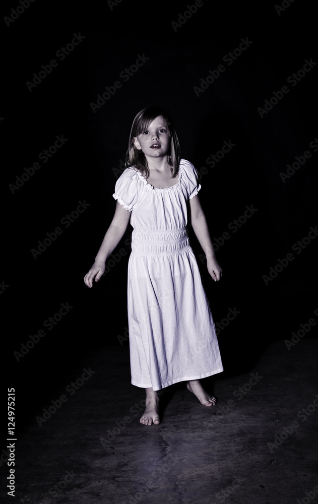 Girl wearing a white nightgown