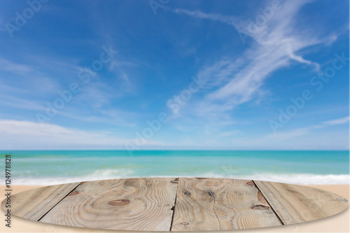 wooden floor with beautiful blue sky scenery for background. © panya99