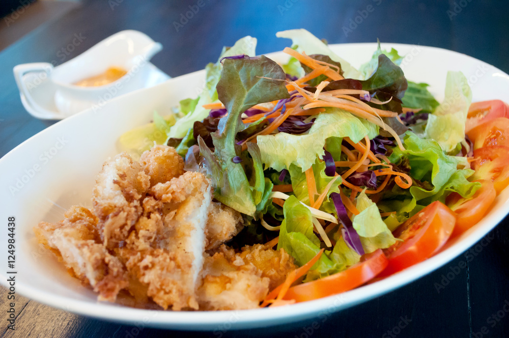 Breaded chicken with salad ,soft focus Breaded chicken with salad ,soft focus