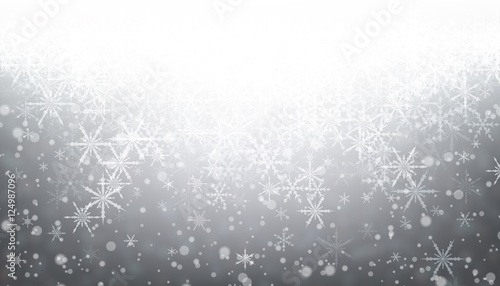 Gray winter background with snowflakes.