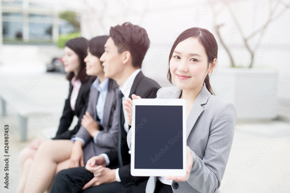 businesspeople show tablet to you businesspeople show tablet to you