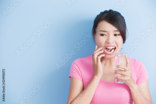 Photography woman with sensitive teeth