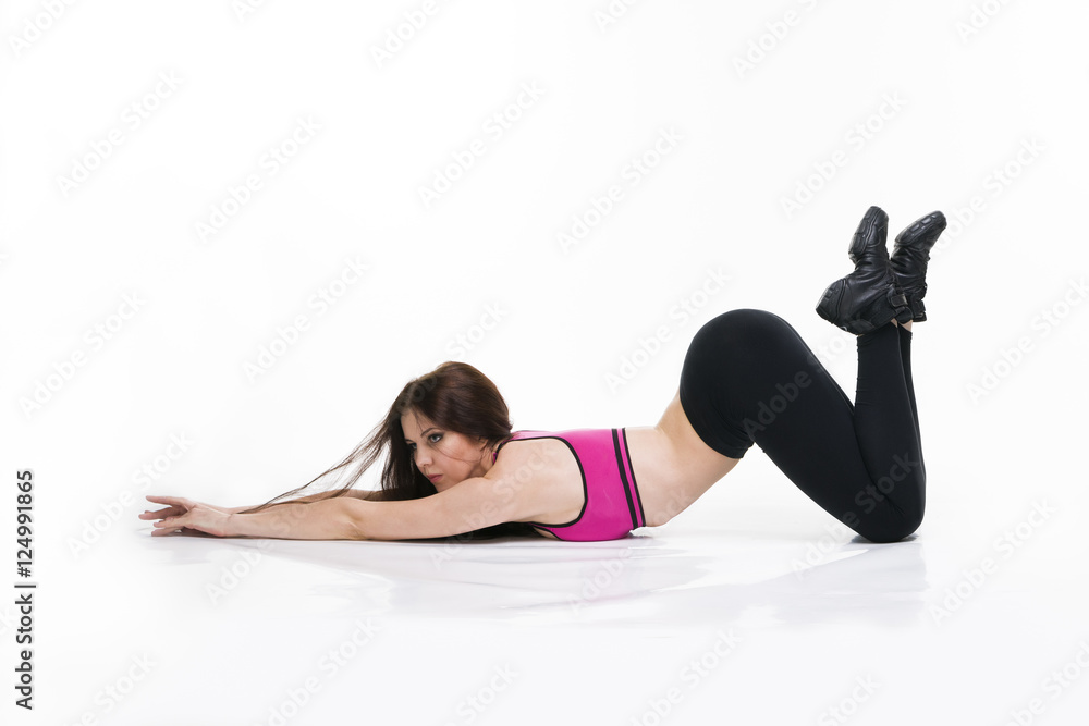 Young beautiful caucasian woman in yoga pose in studio isolated on white background Young beautiful caucasian woman in yoga pose in studio isolated on white background