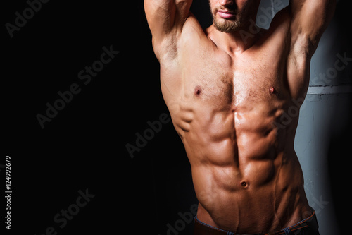 Foto Muscular and sexy torso of young man having perfect abs