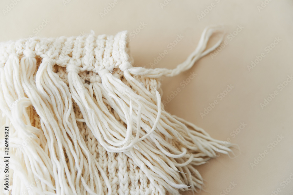 warm White knit scarf with tassels. Close warm White knit scarf with tassels. Close