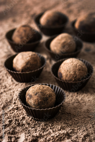 Homemade chocolate truffles with cocoa dusted

