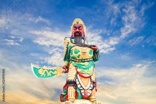 Statue kwnao on sky background ,Chinese legend of the god's stat