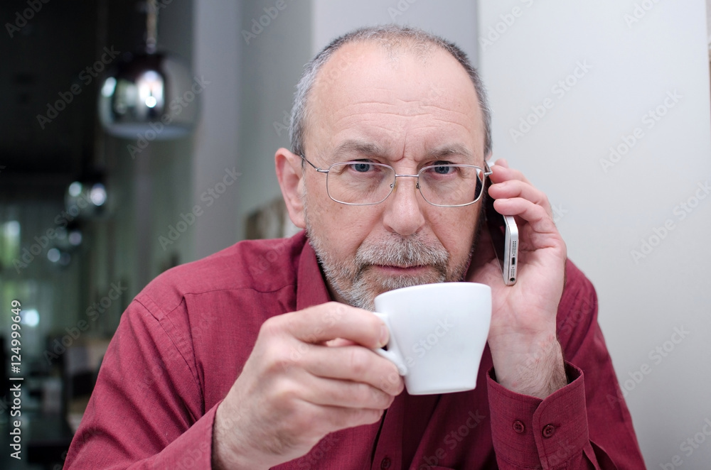 Aged man with the phone Aged man with the phone
