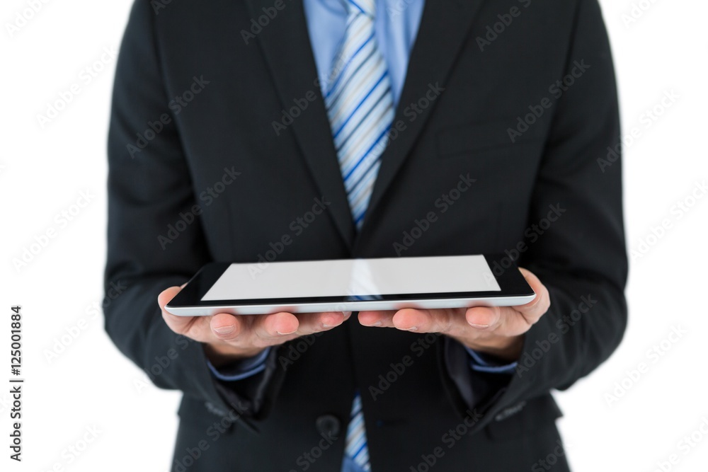Mid section of businessman holding mobile phone Mid section of businessman holding mobile phone