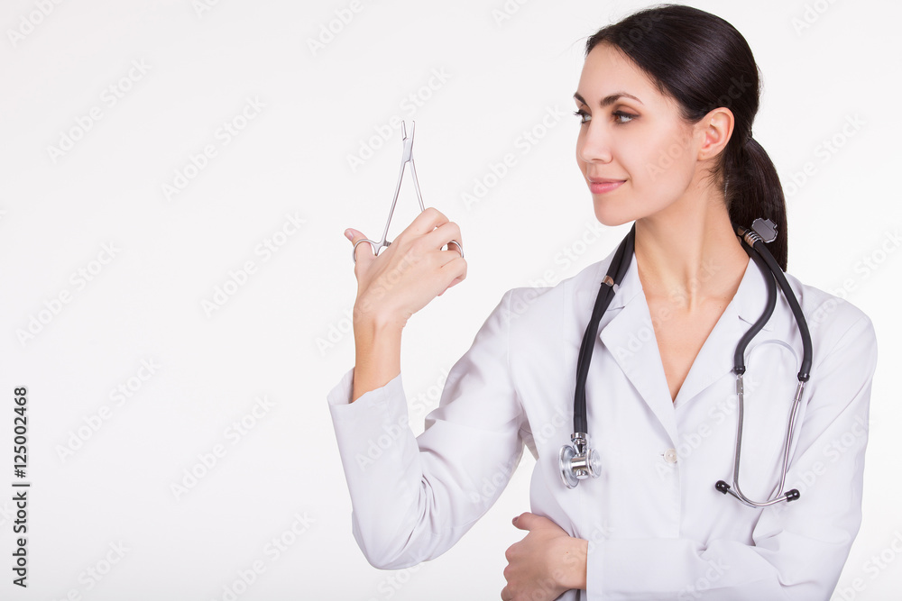 Portrait of a friendly female doctor isolated on white Portrait of a friendly female doctor isolated on white