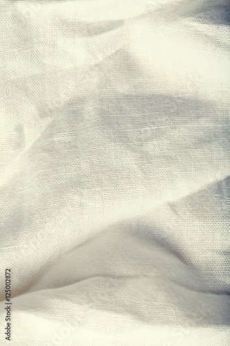 White wrinkled fabric, textured background