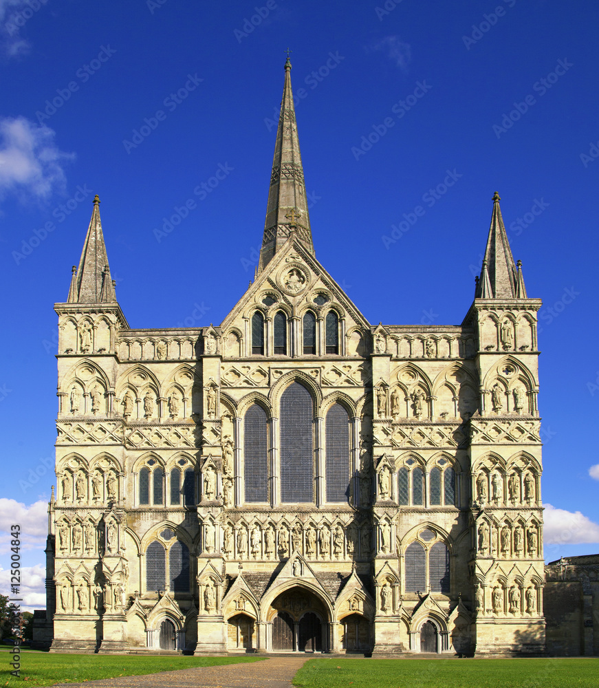 Cathedral with the tallest church spire in the UK on a sunny day.