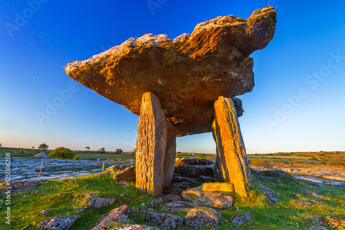 Poulnabrone portal tomb in Burren at sunrise, Ireland