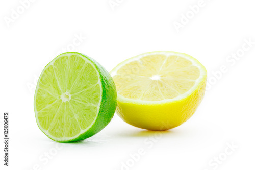 Fresh lime and lemon isolated on white background