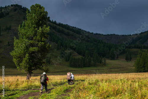 Tourists on the dirty road in the Altai mountain, Russia