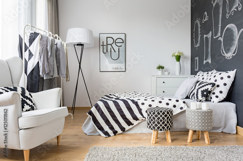 Cozy bedroom with blackboard wall