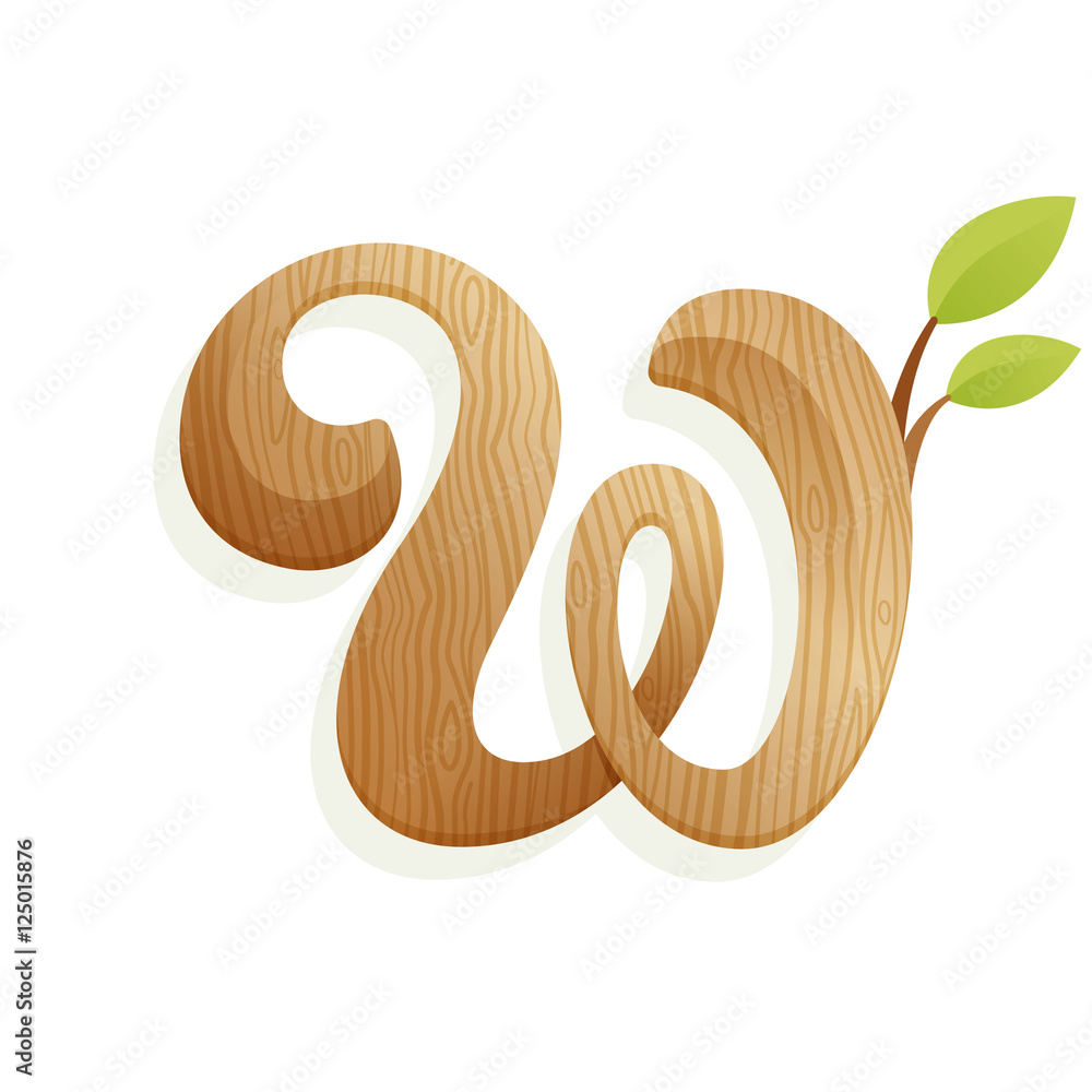 Φωτογραφία W letter logo with wood texture and green leaves.