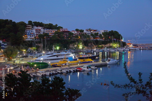 Evening in the Patitiri port,Alonissos,Greece © vladuzn