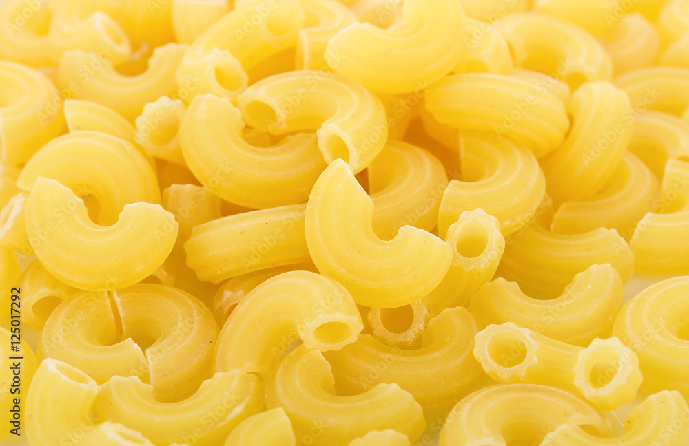 dry macaroni background,italian pasta. top view dry macaroni background,italian pasta. top view
