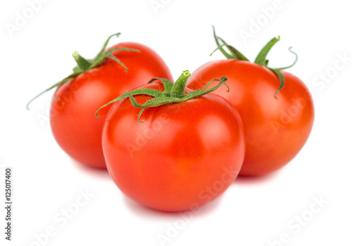Three red ripe tomatoes