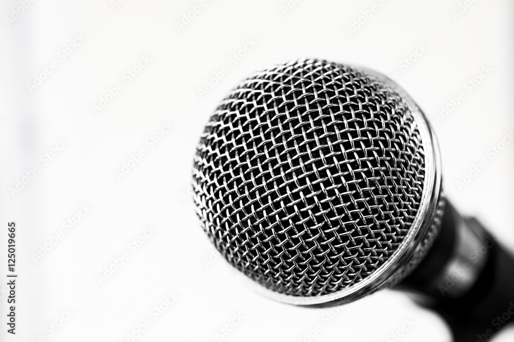 Isolated metal microphone on white background Isolated metal microphone on white background