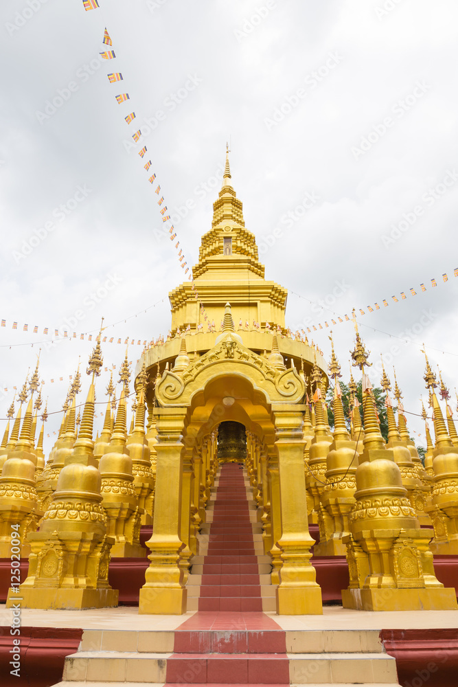 Naklejka premium Wat Pa Sawangboon temple with golden pagoda, Saraburi, Thailand