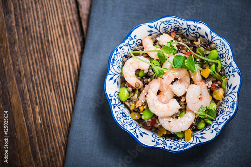 Wholefood salad with sezame and prawns photo