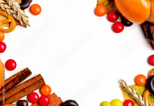 Fototapeta Naklejka Na Ścianę i Meble -  Background with fruits cinnamon and candy.Copy space.
