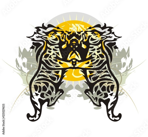 Two tribal lynxes. Grunge lynxes against the decorative sun for your design  