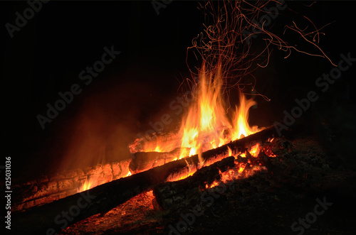 Night bonfire on the river