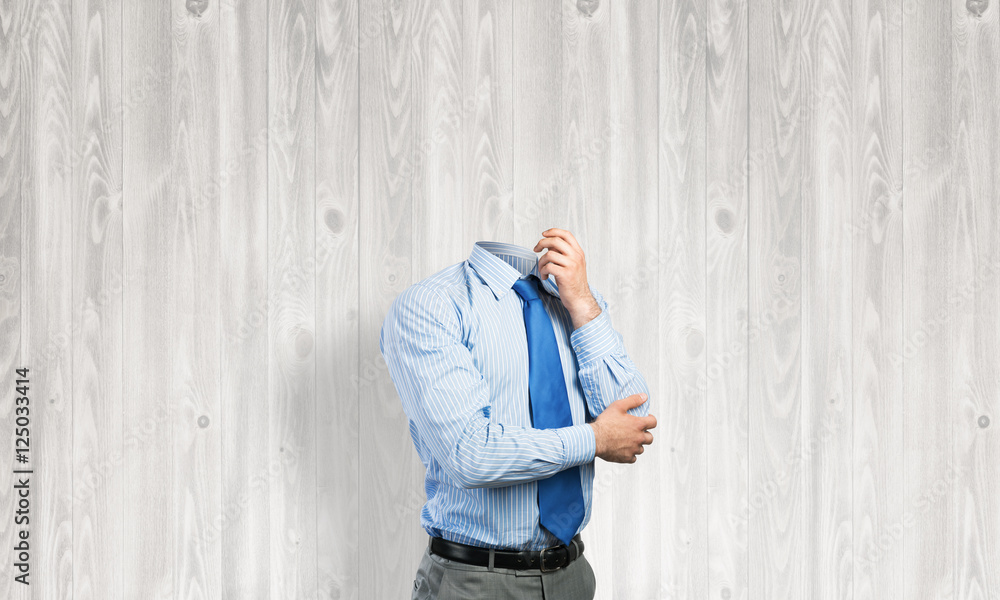 Headless pensive businessman