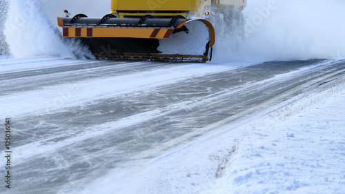 Snowplow Removes Snow Off Road