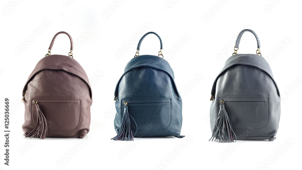 Fototapeta premium group of leather color backpacks isolated on white background