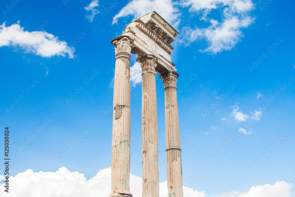      Ruins and columns of temple of Castor and Pollux in Roman Forum (Forum Romanum), , blue sky in background, Rome, Italy 