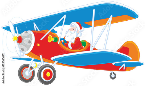 Santa Claus piloting his old wood airplane