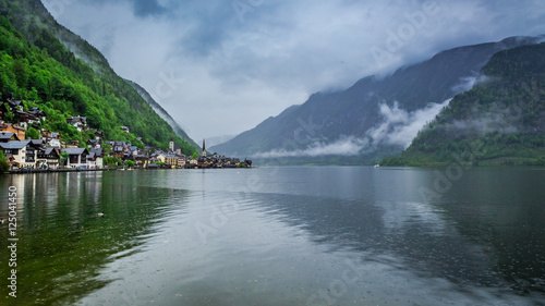 Clouds and rain under mountain lake in Hallstatt in spring