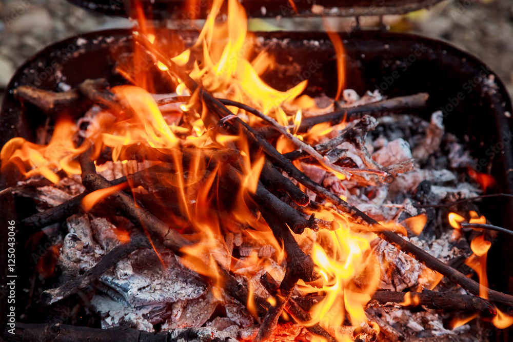 Charcoal Burning in BBQ or in the Frame Background and Texture. Charcoal Burning in BBQ or in the Frame Background and Texture.