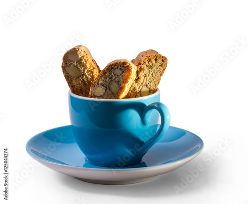 Caffee and cantuccini with shadow in heart shape