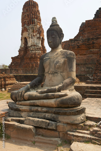 Ancient stone temple on sunny day in Ayuttaya  Thailand.