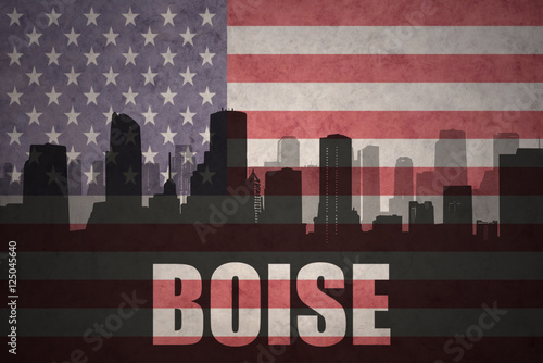 abstract silhouette of the city with text Boise at the vintage american flag