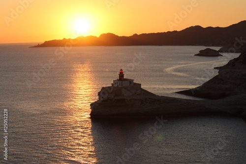 france, corsica. bonifacio lighthouse at sunset 