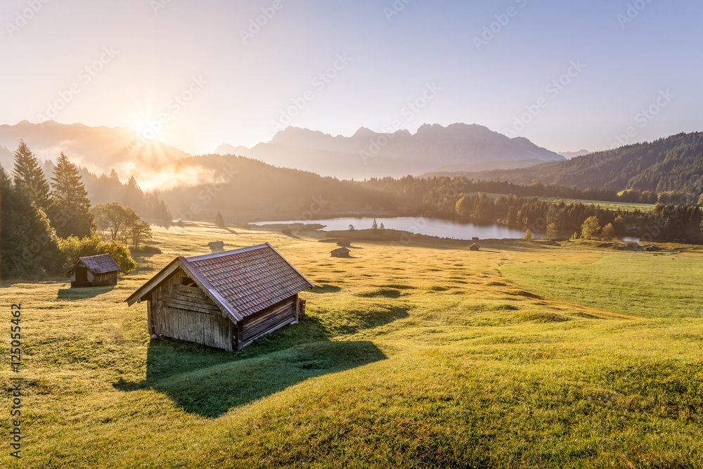 View over Geroldsee with wooden hut and Karwendel mountains at morning,  Bavaria, Germany Stock-Foto | Adobe Stock