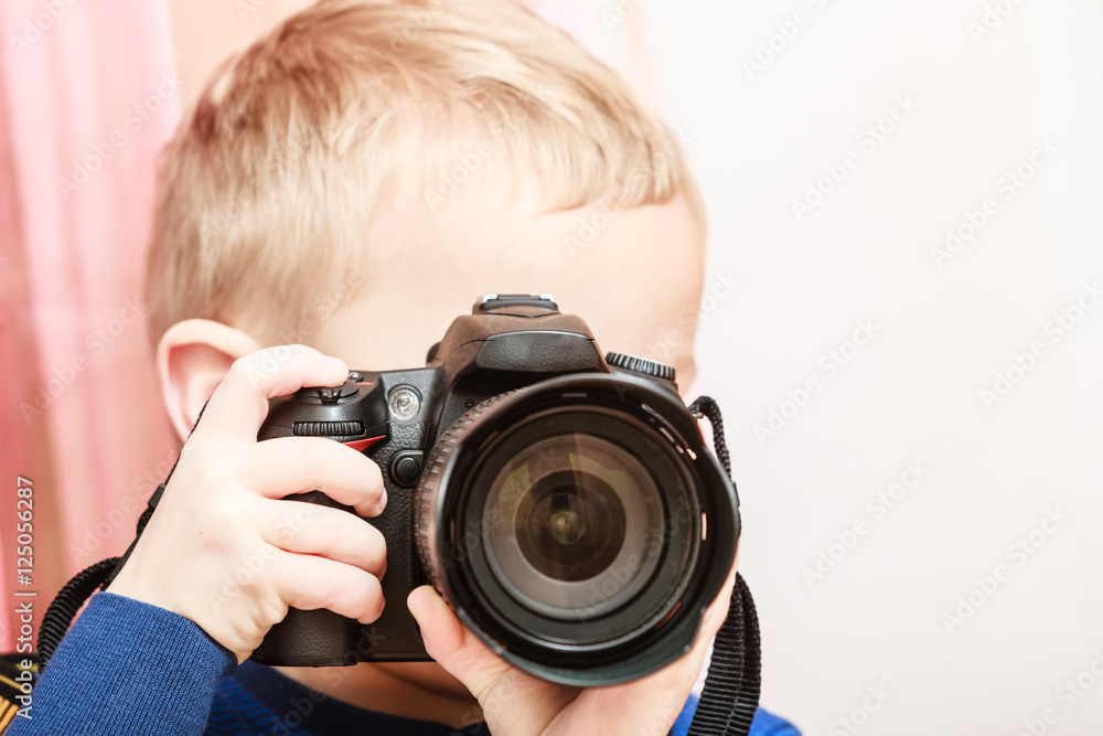 Little boy take photo with camera. Little boy take photo with camera.
