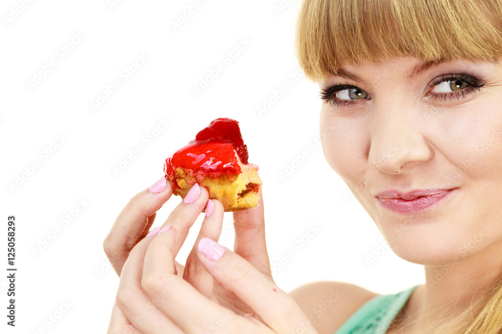 Woman eating cupcake sweet food