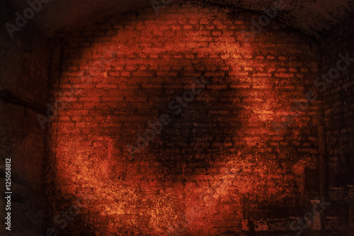 Light painted red circle sign on old grunge brick wall or textur